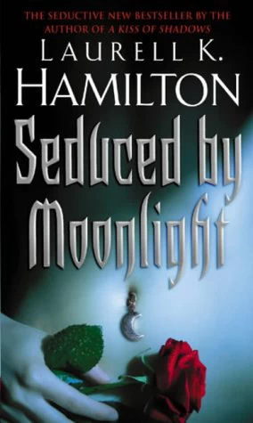 Seduced by Moonlight (Meredith Gentry #3) by Laurell K. Hamilton